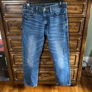 Levi Denizen 232 slim straight cut blue jeans